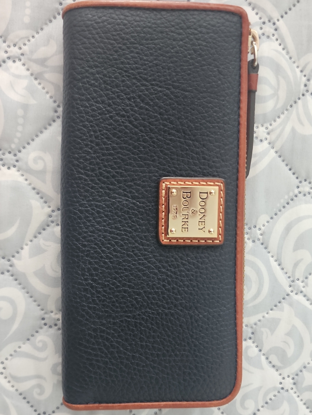 Dooney & Bourke Black Leather Zip Wallet with Brown Trim